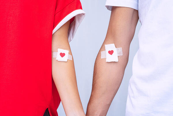 Man and woman blood donors. Blood donation. World blood donor da